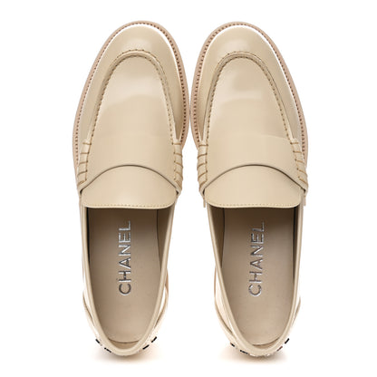 Chanel Shiny Calfskin Logo Loafers 39.5 Beige 2 of 11