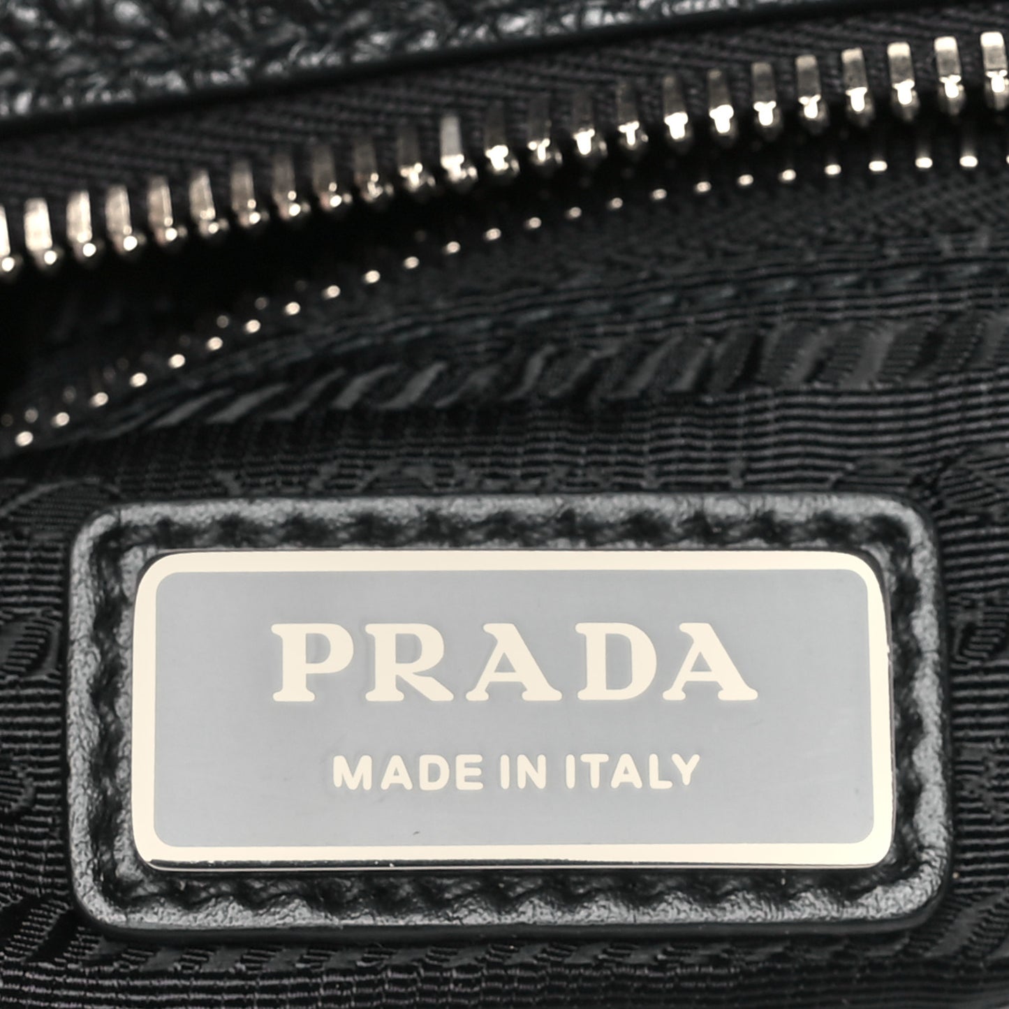 Vitello Daino Triangle Logo Embossed Shoulder Bag Black