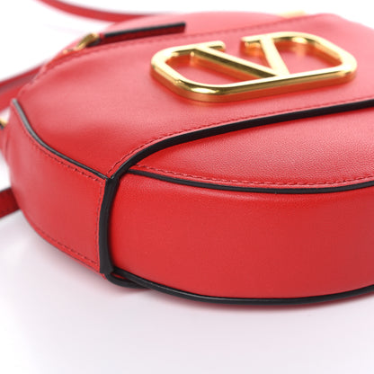 Valentino Garavani Calfskin VLogo Round Crossbody Bag Rouge Pur 7 of 8