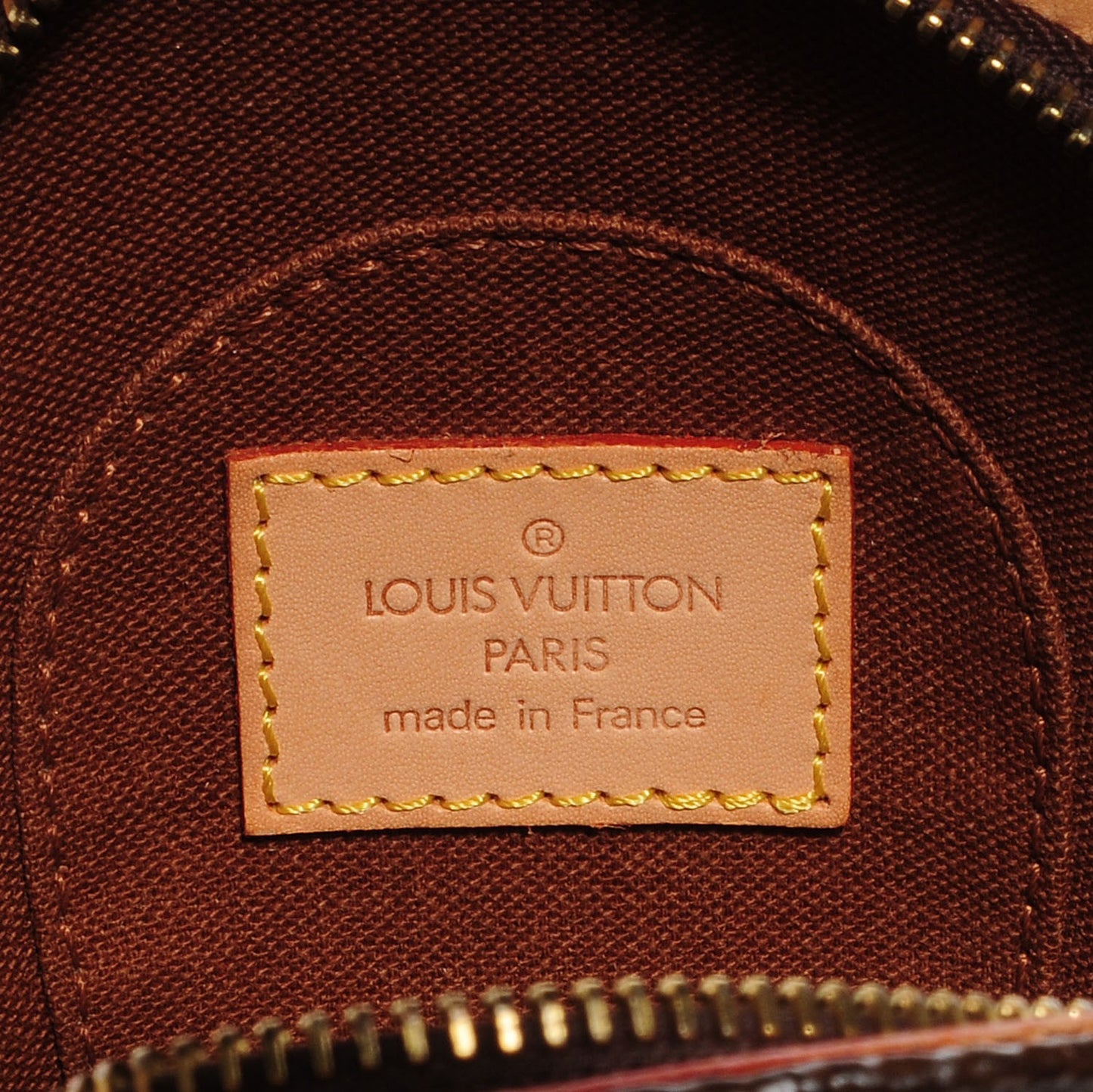 Monogram Mini Ellipse Wristlet Clutch