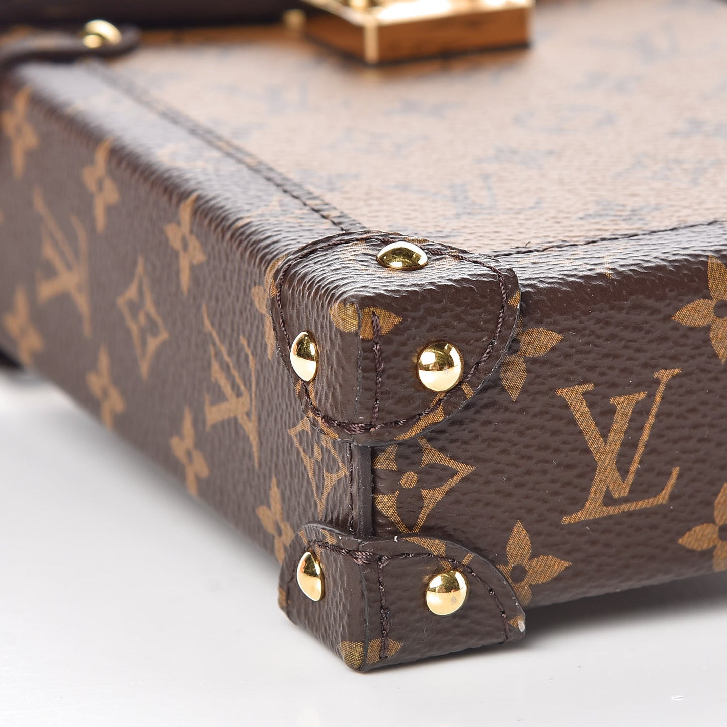 Reverse Monogram Pochette Trunk Verticale