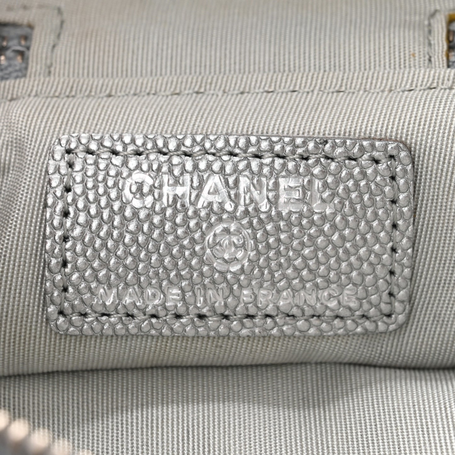 Metallic Caviar Quilted Mini Top Handle Vanity With Chain Silver
