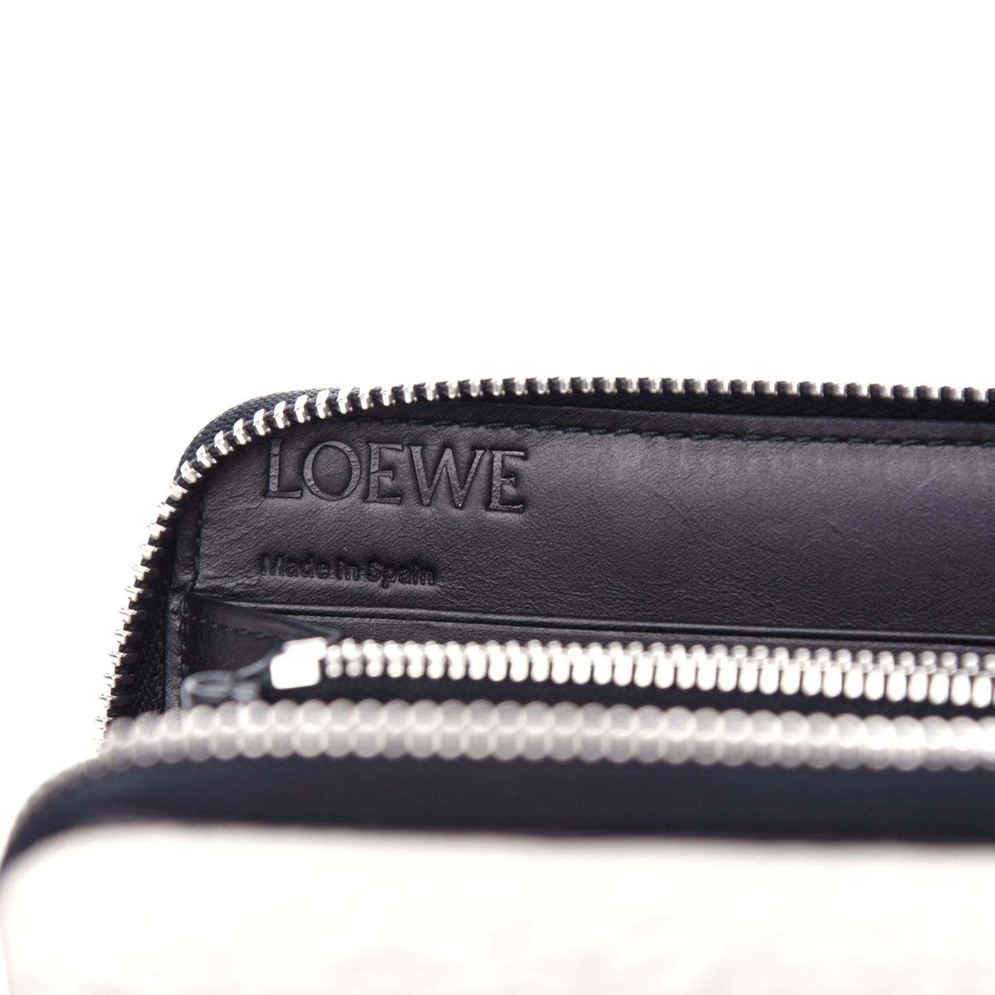 Calfskin Embossed Repeat Zip Wallet Light Oat
