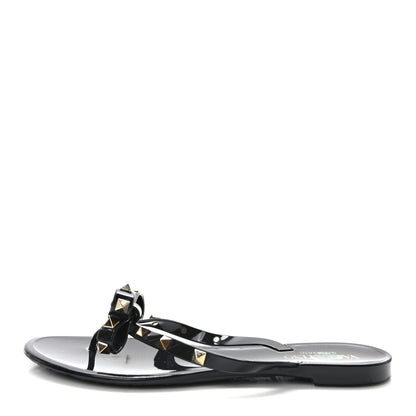 Valentino Garavani VALENTINO GARAVANI PVC Jelly Rockstud Bow Thong Sandals 38 Black 1 of 7