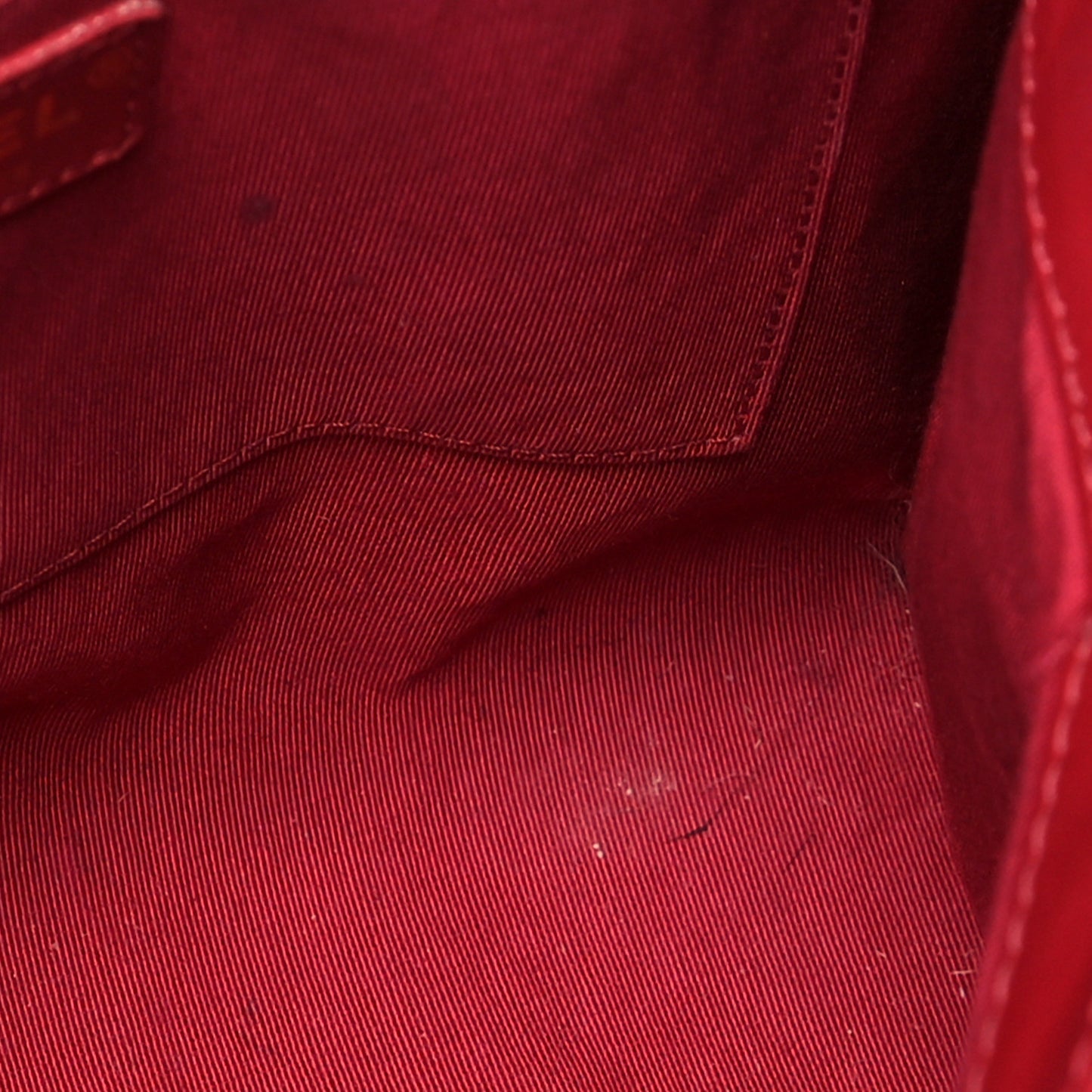 Aged Calfskin Chevron Quilted Backpack Red