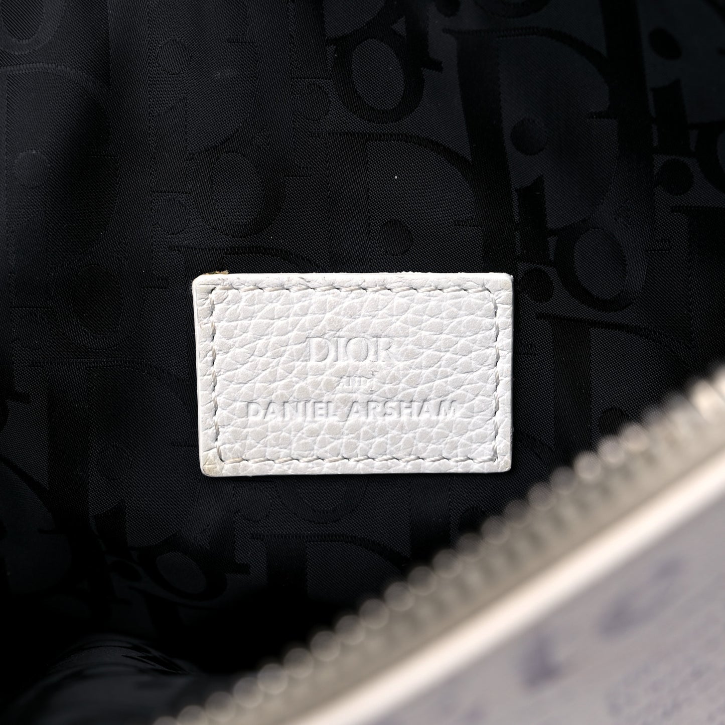 X DANIEL ARSHAM Grained Calfskin Newspaper Print Saddle Bag White