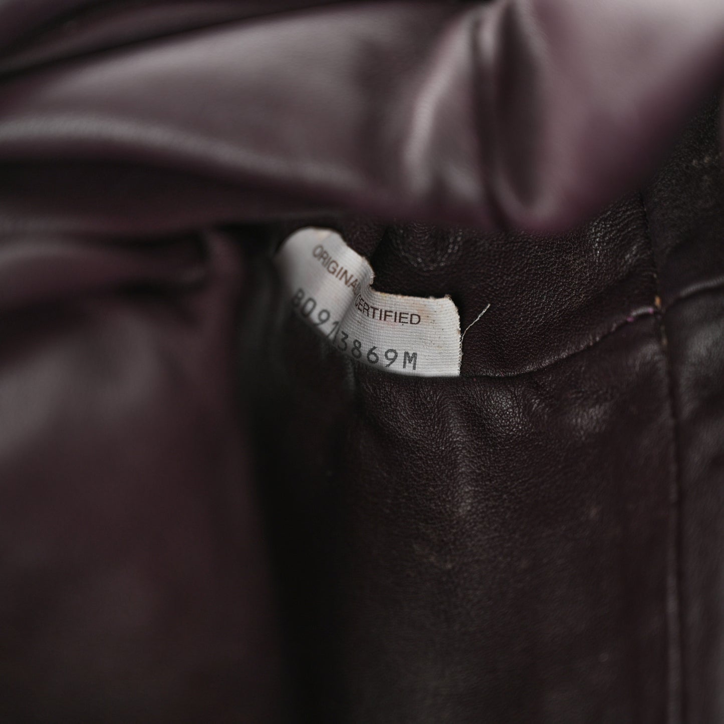 Butter Calfskin The Mini Pouch Grape