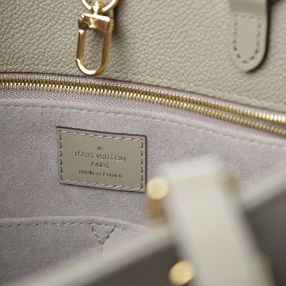 Louis Vuitton Empreinte Monogram Giant Onthego MM Tourterelle 9 of 10