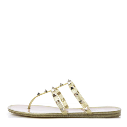 Valentino Garavani PVC Jelly Glitter Rockstud Caged Flat Thong Sandals 39 Oro 1 of 8