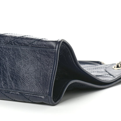 Saint Laurent Crinkled Calfskin Matelasse Monogram Niki Shoulder Bag Deep Marine 10 of 10