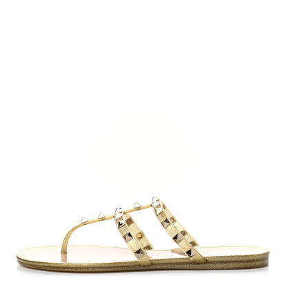 Valentino Garavani PVC Jelly Glitter Rockstud Caged Flat Thong Sandals 39 Oro 1 of 7