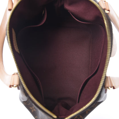 Louis Vuitton Monogram Rivoli PM 7 of 10