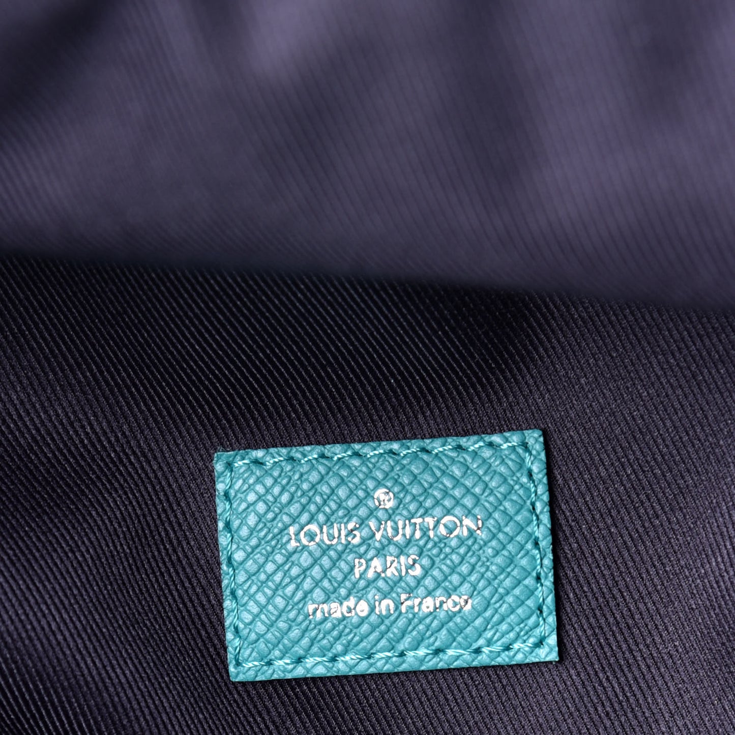 Taiga Monogram Discovery Backpack PM Turquoise