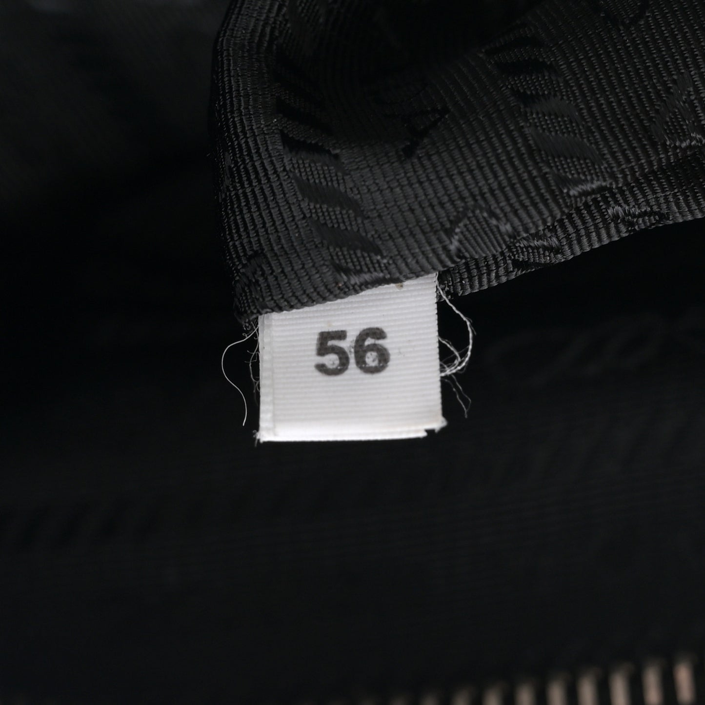 Vitello Daino Triangle Logo Embossed Shoulder Bag Black