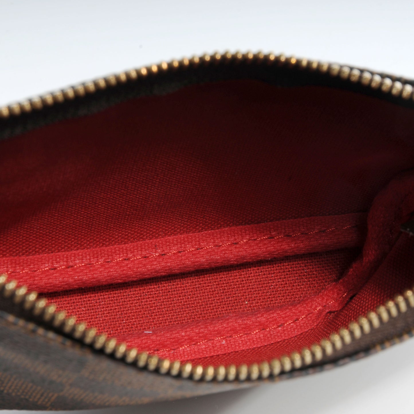 Damier Ebene Mini Pochette Accessories Bag