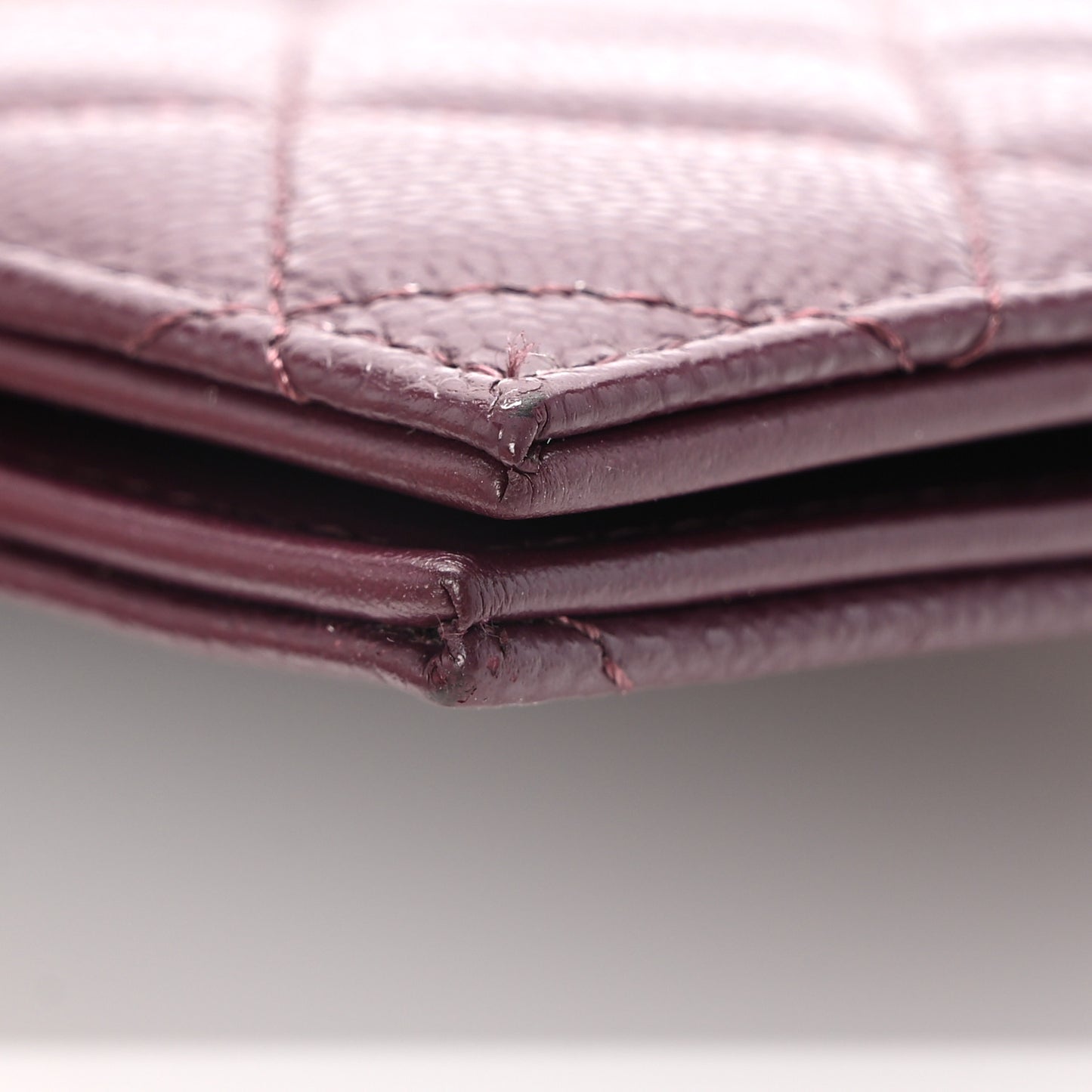 Caviar Quilted Passport Holder Dark Purple