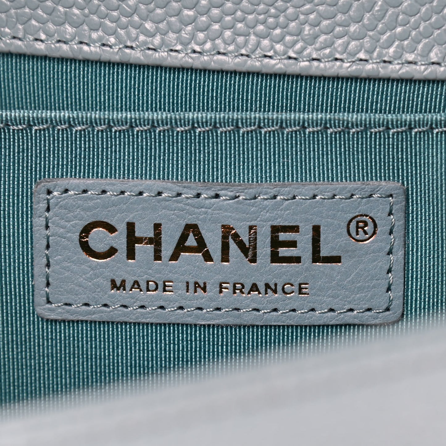 Caviar Quilted Medium Boy Flap Light Blue