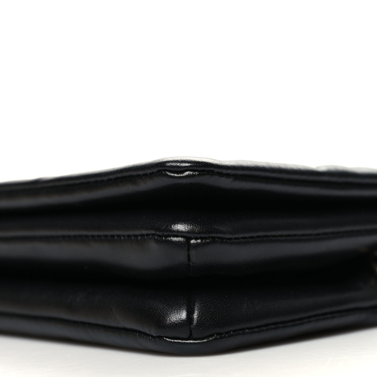 Lambskin Embossed Monogram Pochette Coussin Black