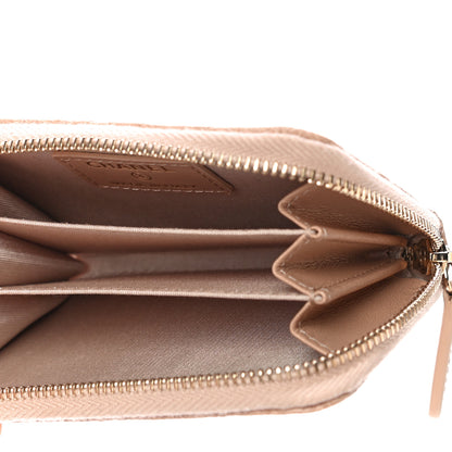 Chanel Calfskin Camellia Embossed Zip Coin Purse Beige 5 of 10