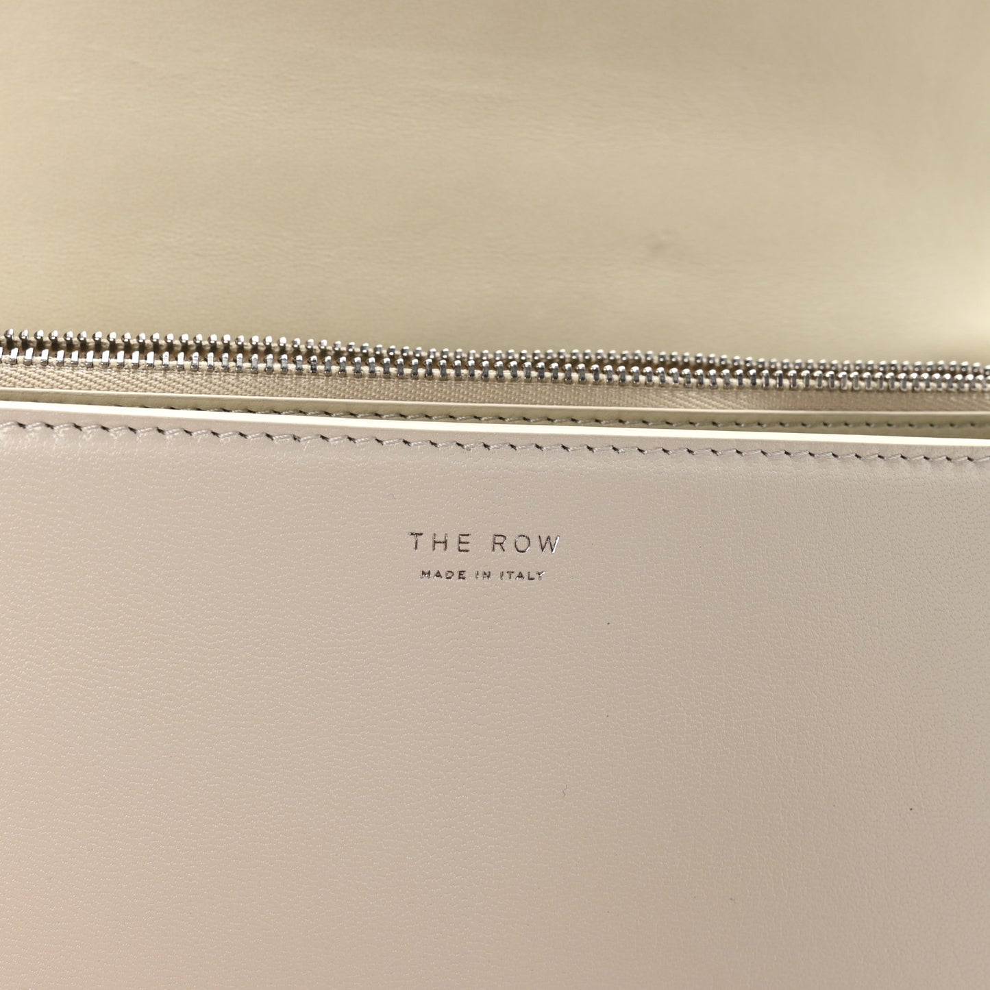 Sleek Calfskin The Sofia 10 Top Handle Ivory