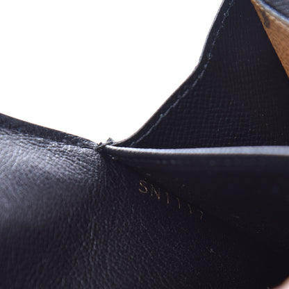 Louis Vuitton Calfskin Reverse Monogram Column Sarah Wallet Black 8 of 9
