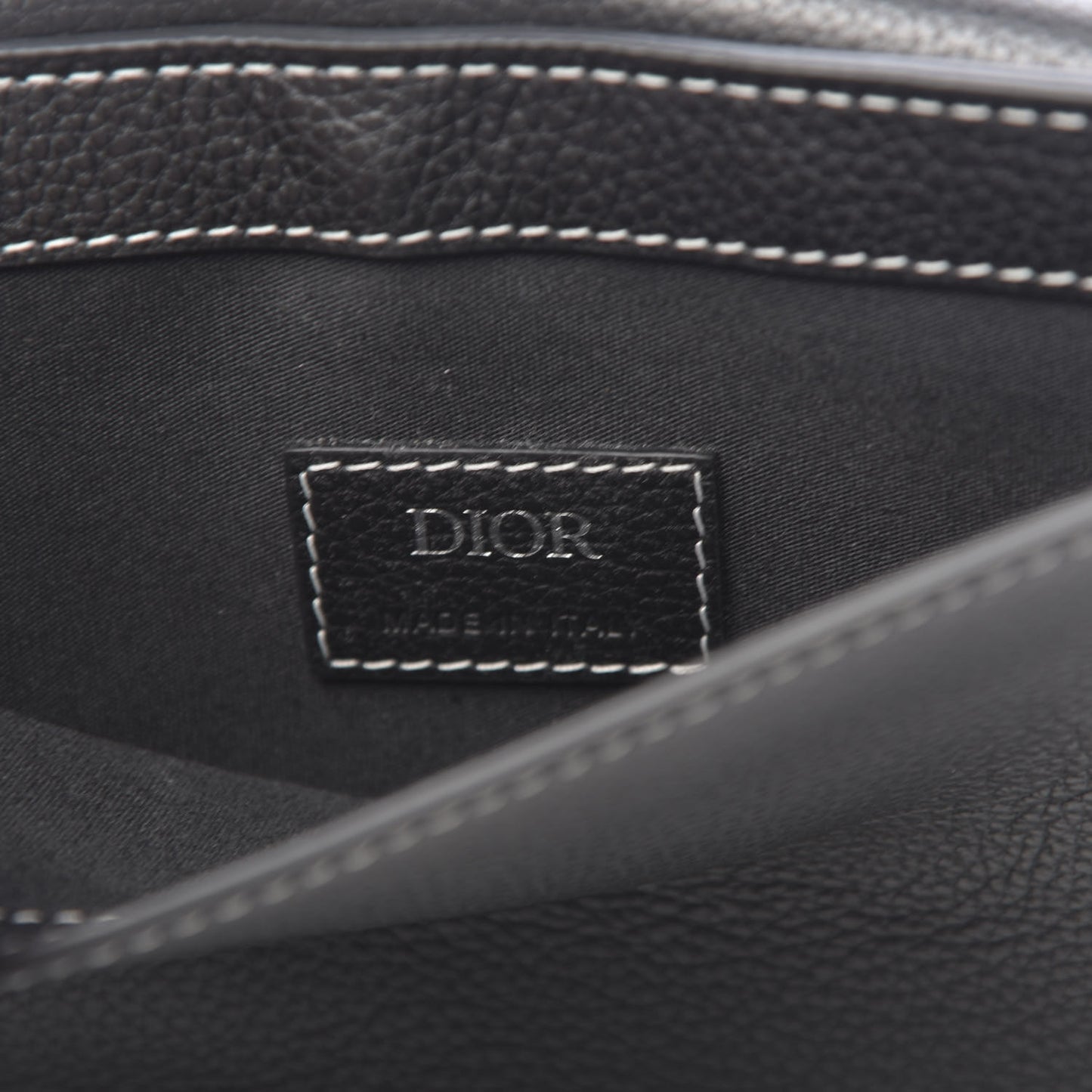 X KAWS Grained Calfskin Saddle Pouch Black