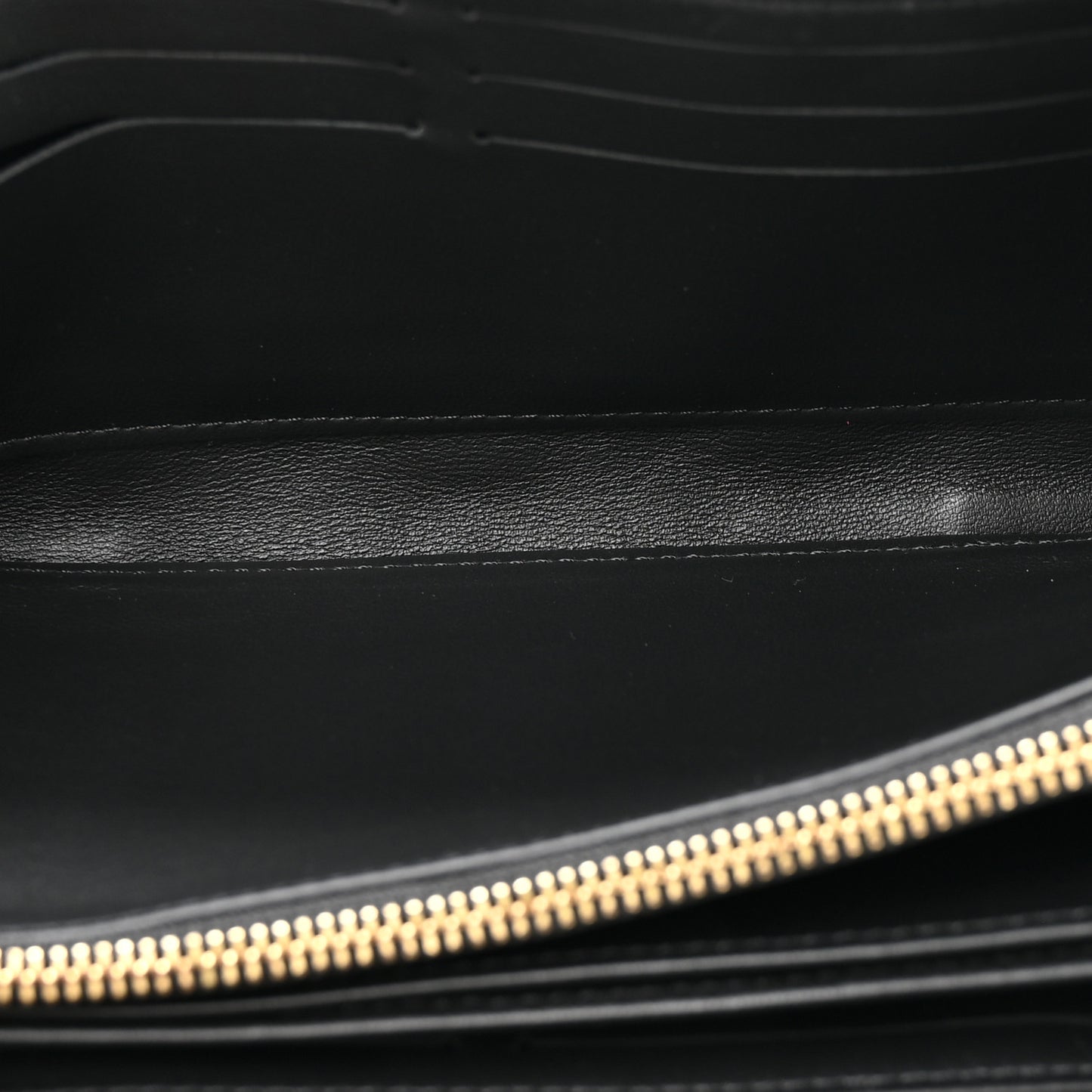 Lambskin Embossed Monogram Coussin Zippy Wallet Black