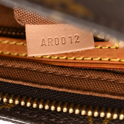 Louis Vuitton Monogram Trotteur 7 of 14