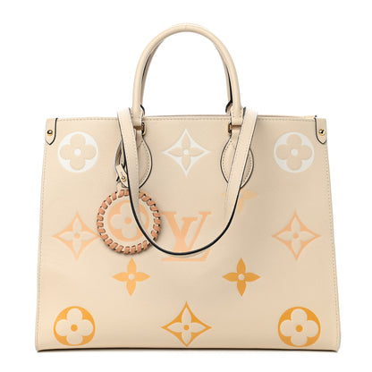 Louis Vuitton Empreinte Monogram Giant By The Pool Onthego MM Cream Saffron 1 of 11