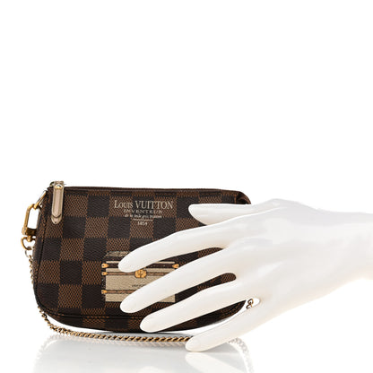 Louis Vuitton Damier Ebene Trunks and Locks Mini Pochette Accessories 2 of 8