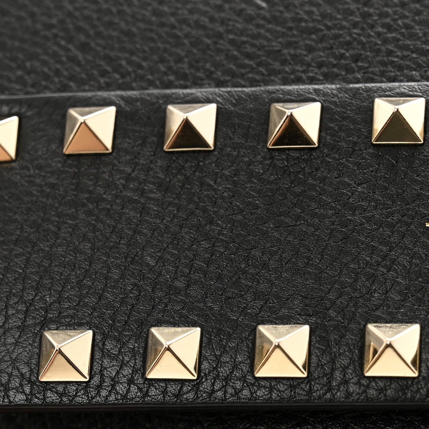 Pebbled Calfskin Rockstud Side Slip Crossbody Black