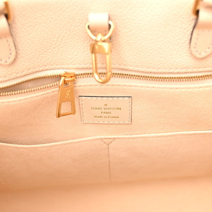 Louis Vuitton Empreinte Monogram Giant Onthego MM Creme 6 of 9