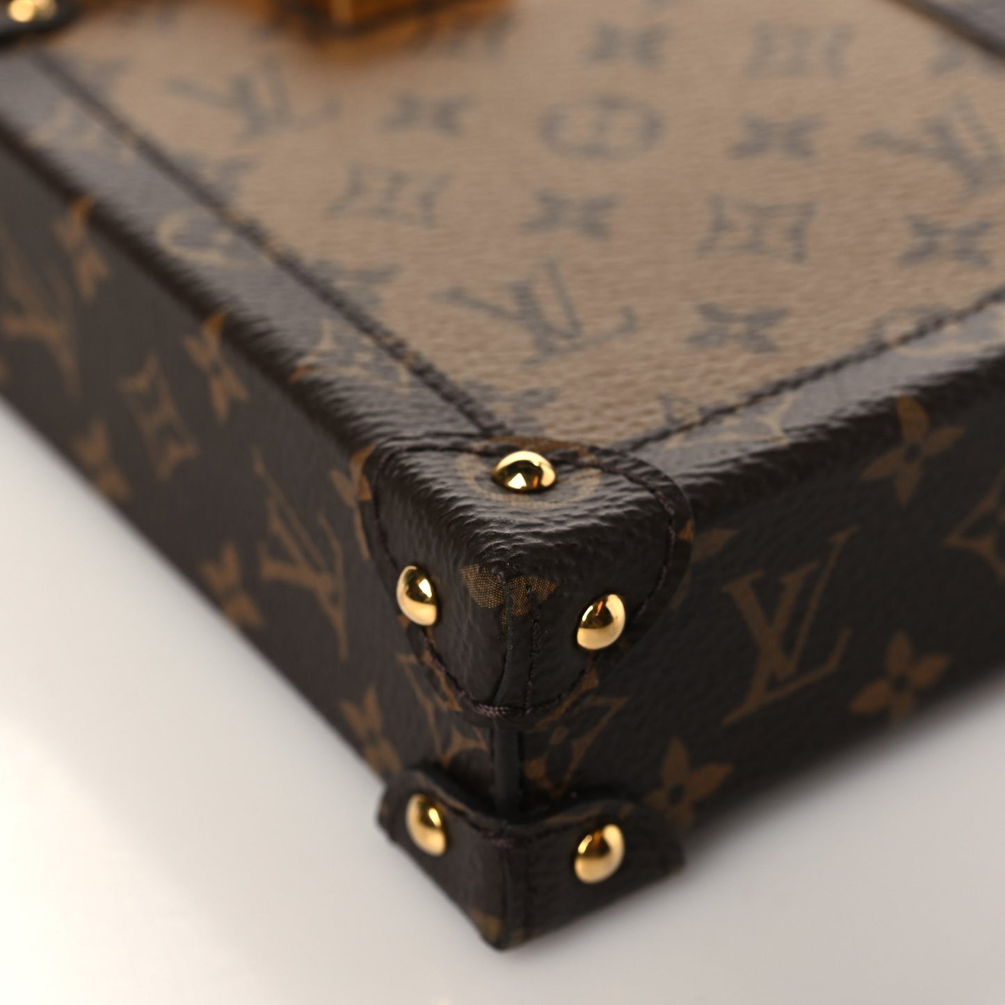 Reverse Monogram Pochette Trunk Verticale