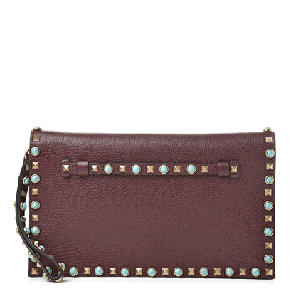 Valentino Garavani Pebbled Calfskin Rockstud Rolling Wristlet Clutch Rubin 1 of 11