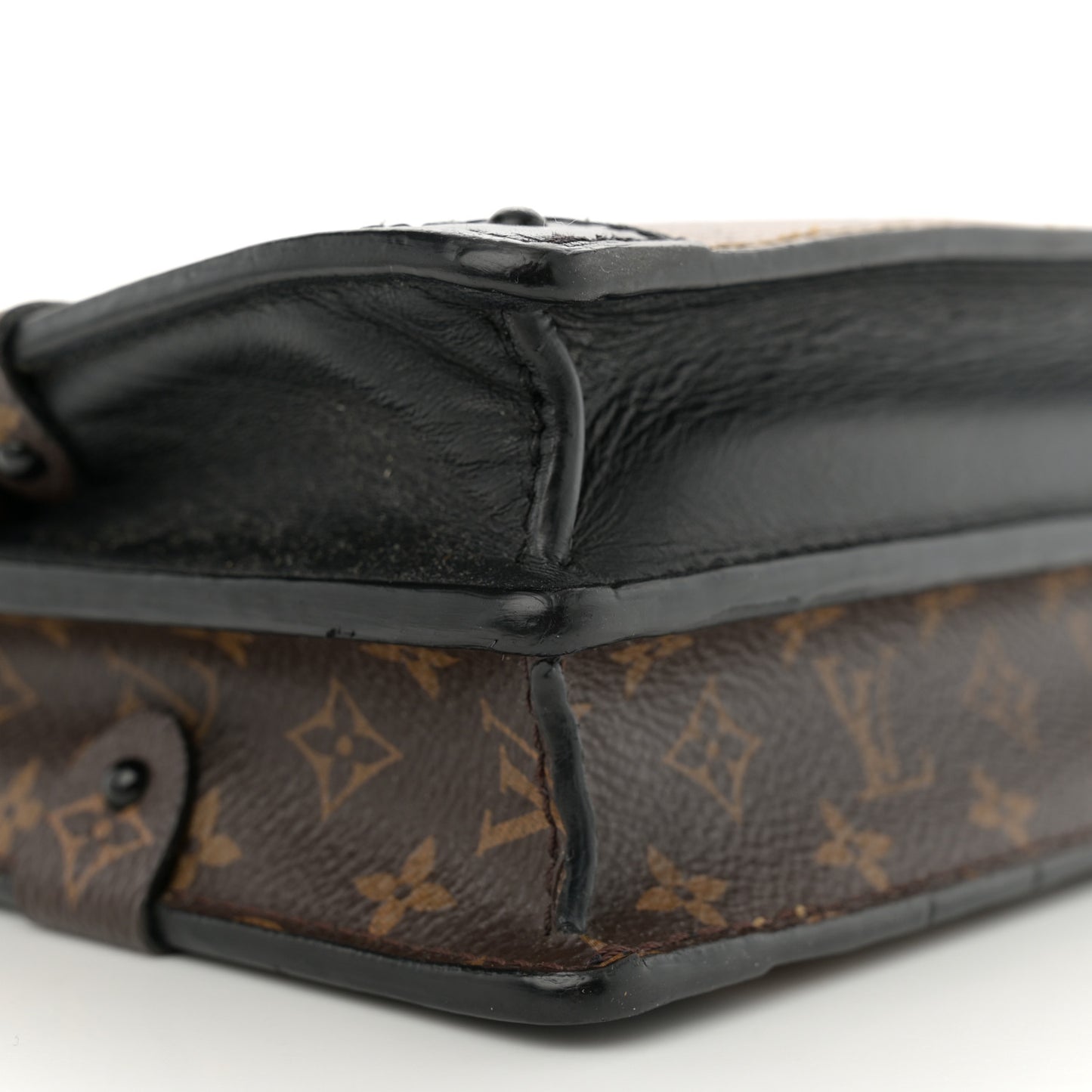 Reverse Monogram Trunk Clutch