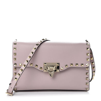 Valentino Garavani Vitello Medium Rockstud Flip Lock Crossbody Bag Poudre 1 of 9