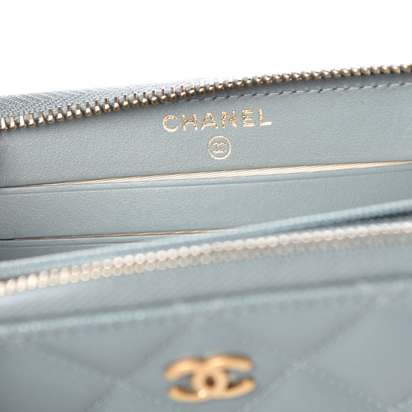 Iridescent Caviar Quilted Medium Zip Around Wallet Light Blue