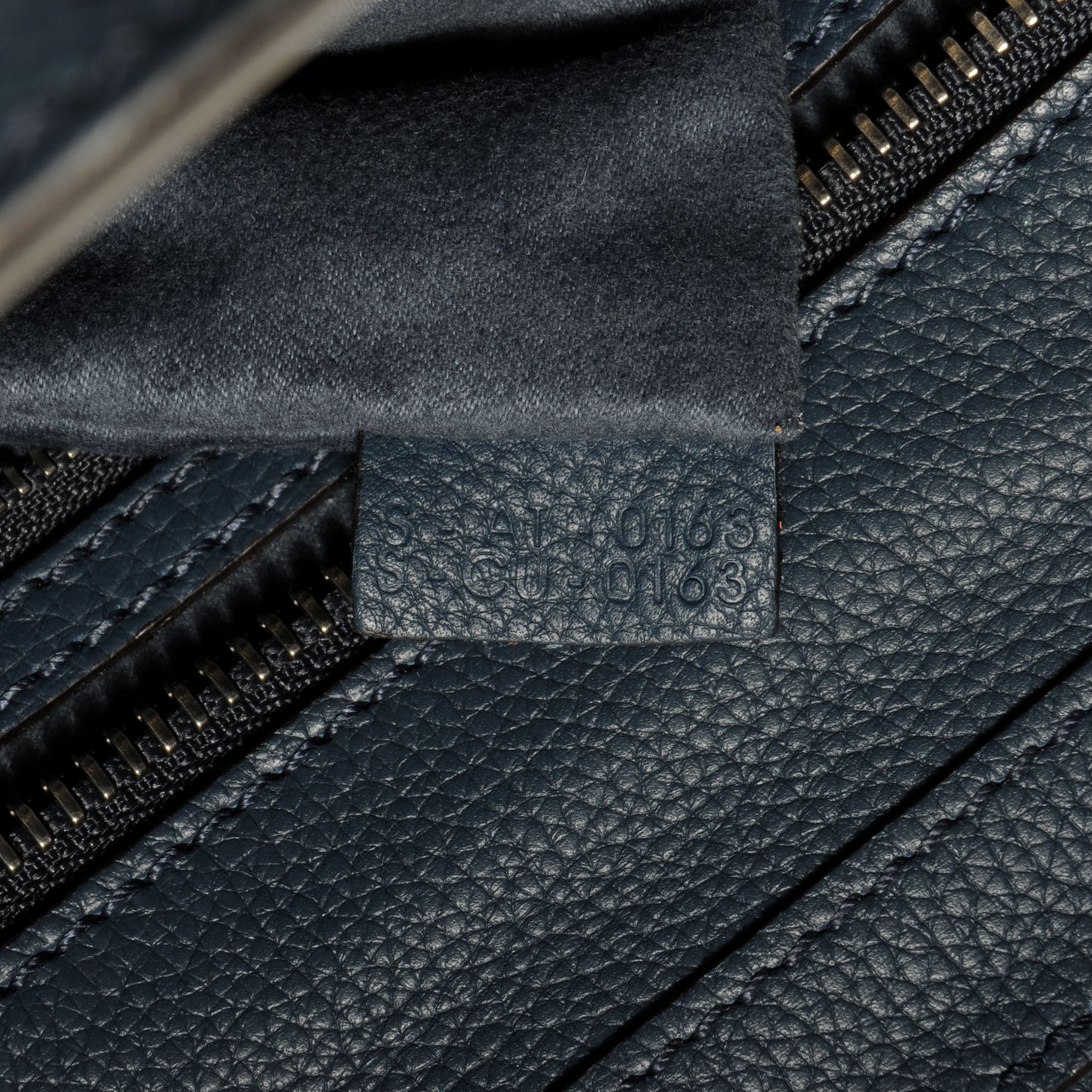Drummed Leather Micro Luggage Bag Orage