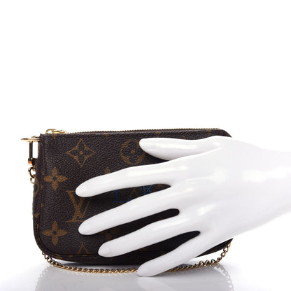 Louis Vuitton Monogram My LV Heritage Mini Pochette Accessories Black Bleu Clair 2 of 11