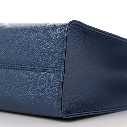 Louis Vuitton Metallic Empreinte Monogram Giant Onthego PM Navy Nacre 8 of 8