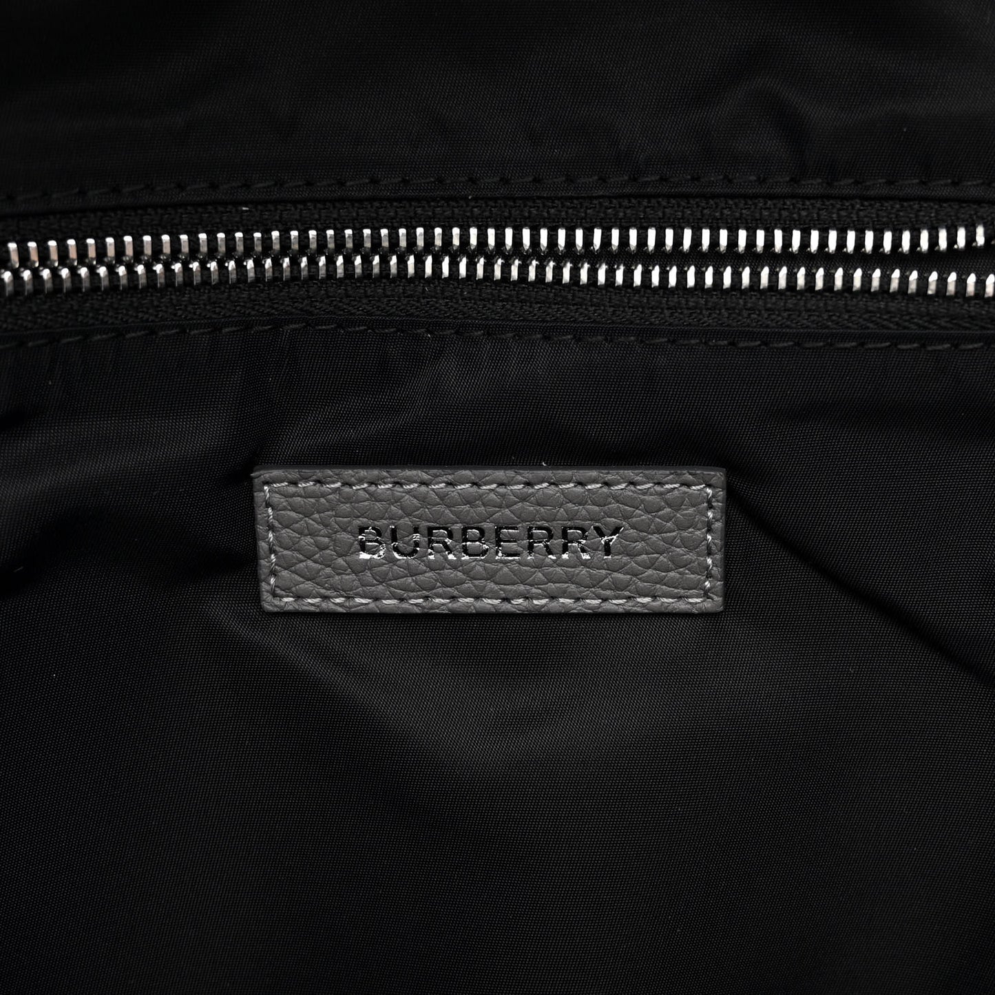 Calfskin Logo Embossed Backpack Charcoal Grey