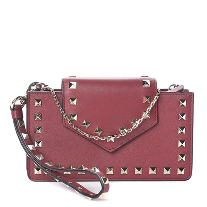 Valentino Garavani Calfskin Rockstud Phone Case With Chain Rubino 1 of 7