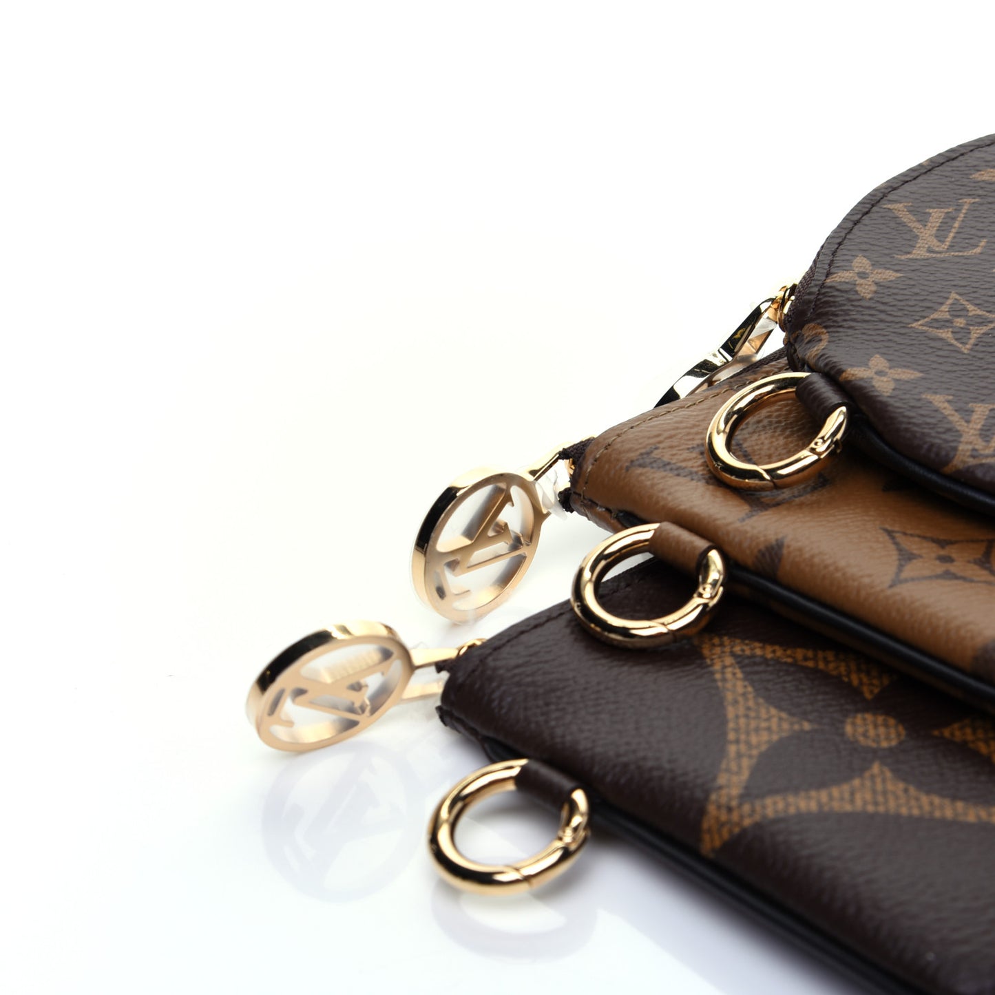 Reverse Monogram Giant Trio Pouch