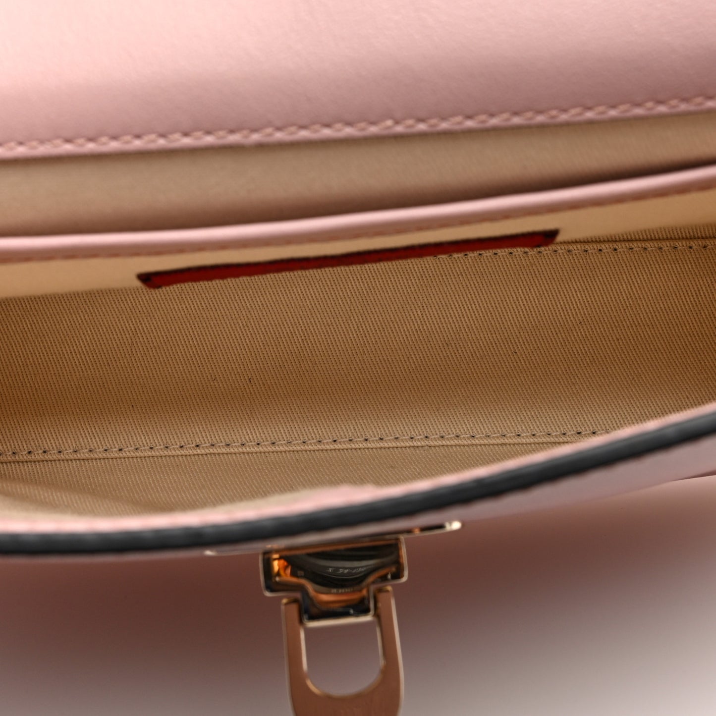 Vitello Medium Rockstud Flip Lock Crossbody Bag Rose Quartz