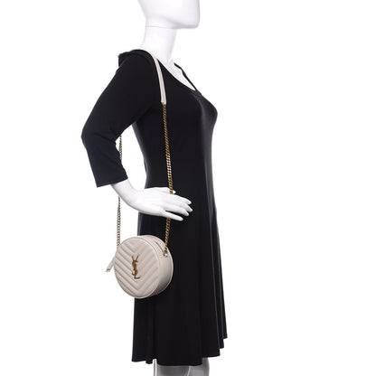 Saint Laurent Grain De Poudre Matelasse Chevron Quilted Round Vinyle Camera Bag Crema Soft 2 of 10