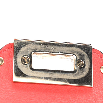 Valentino Garavani Vitello Mini Rockstud Flap Saddle Crossbody Bag Deep Orange 10 of 11