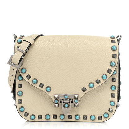 Valentino Garavani Grained Calfskin Turquoise Rockstud Rolling Flip Lock Crossbody Bag Light Ivory 1 of 14