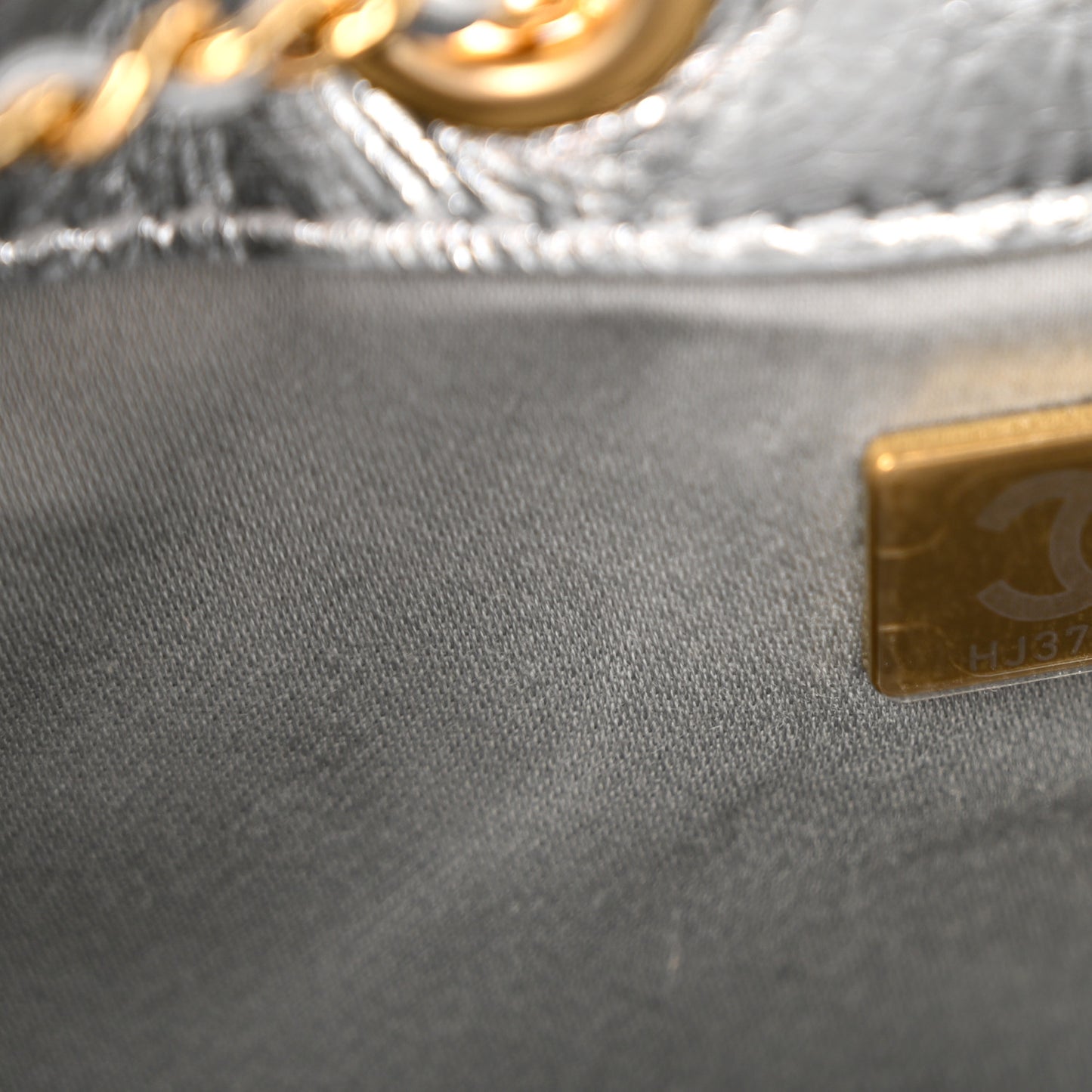 Metallic Aged Calfskin Quilted Mini Chanel 25 Handbag Silver