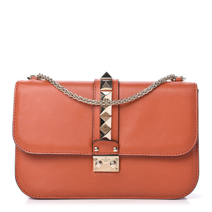 Valentino Garavani Vitello Medium Glam Lock Rockstud Flap Bag Orange 1 of 9
