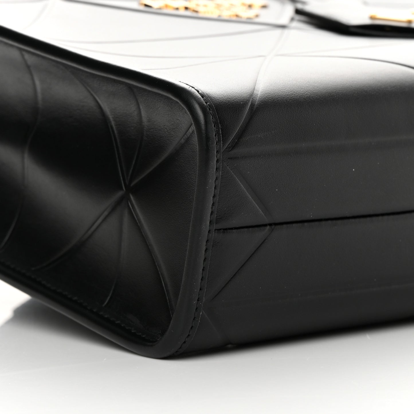 Soft Calfskin Triangolo Symbole Embossed Small Tote Black